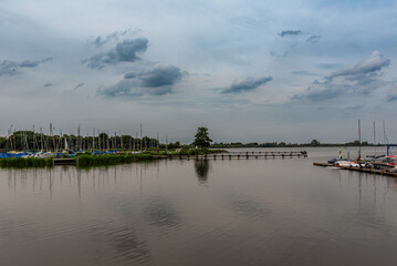 Fototapeta premium Boats in Olgahafen on Lake Dümmer, Lower Saxony, Germany