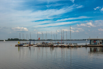 Naklejka premium Boats in Olgahafen on Lake Dümmer, Lower Saxony, Germany