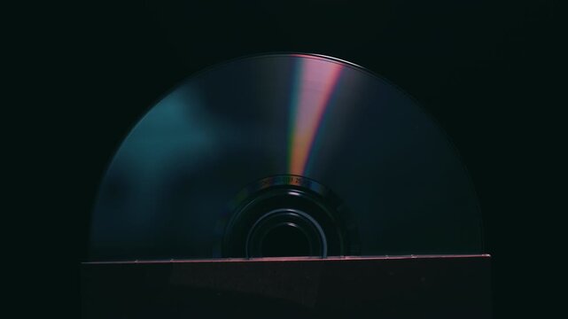 Light shining off the surface of a CD disk