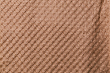 Fototapeta premium Textured Brown Paper Surface with Diagonal Raised Ribbed Pattern for Background
