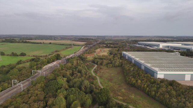 Aerial Drone View of Prologis Park Logistics Warehouses and Green Countryside in Kettering