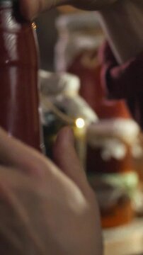 In rustic cellar, man examines rows of jars filled with fermented vegetables, pointing to healthiest ones for cooking. His careful selection underscores traditional preservation methods food safety