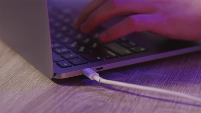 Charging laptop via USB-C from power station while typing