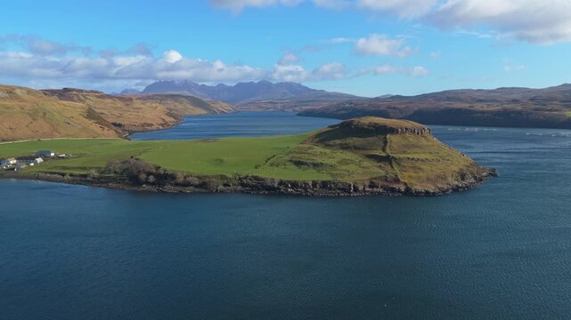 Beautiful panoramic aerial shot of the scottish highlands landscape, revealing the iconic gesture bay viewpoint on the isle of skye