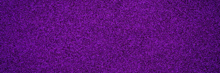 Fototapeta premium Bright purple texture fills the background with a vibrant hue and interesting patterns during daytime