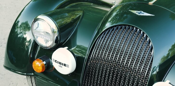 Morgan Plus Four, Retro, Legend of the English car. green car headlight