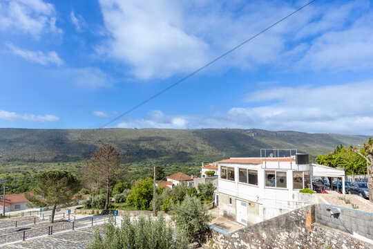 Panoramic View of Mira de Aire Village and Green Hills in Central Portugal