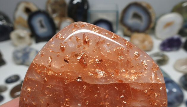 Polished Oregon Sunstone gemstone texture with glowing copper aventurescence