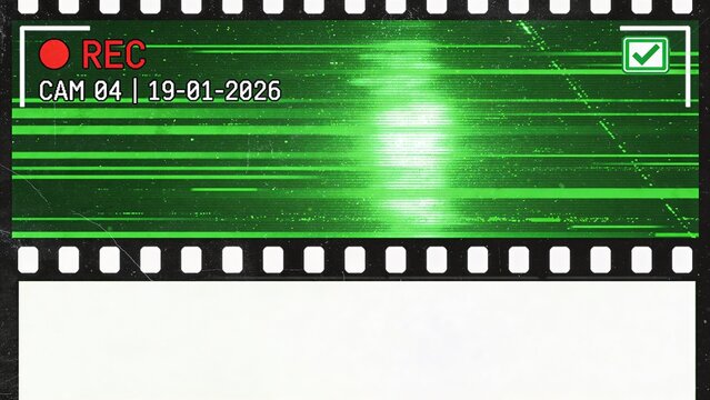 A surveillance camera captures a recording of green lines on a screen