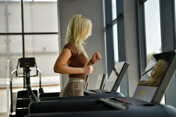 Fototapeta premium Woman Working Out in Gym – Fitness Model Exercise Session