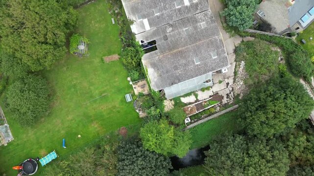 Top Down Aerial View of Burton Bradstock Village Houses and Streets in Dorset England