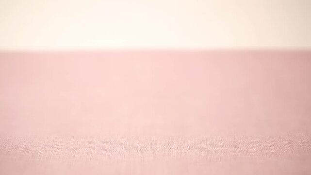 Soft Pastel Pink and Cream Fabric Texture Background Gentle Waves.
