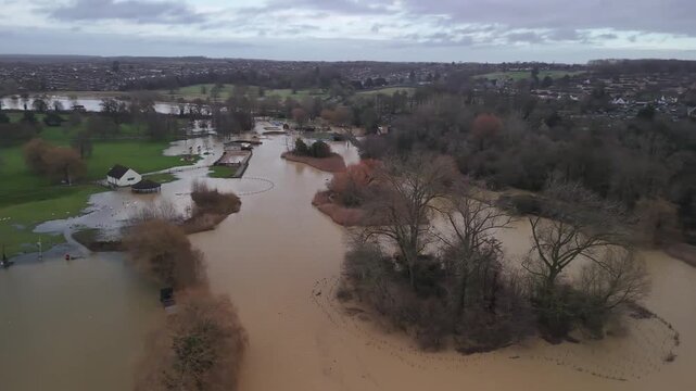 Aerial Drone Forward Flight Over Flooded Park Fields and Trees in Kettering Northamptonshire England