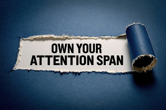 Own Your Attention Span self-control concept on a paper background