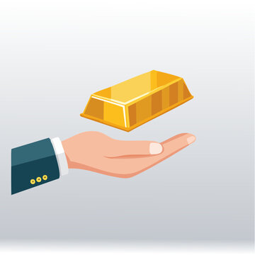 Hand holding a gold bar