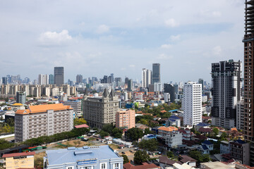 Fototapeta premium Drone shot of smart city real estate development and highrise buildings, Sokha Beach, Sihanoukville
