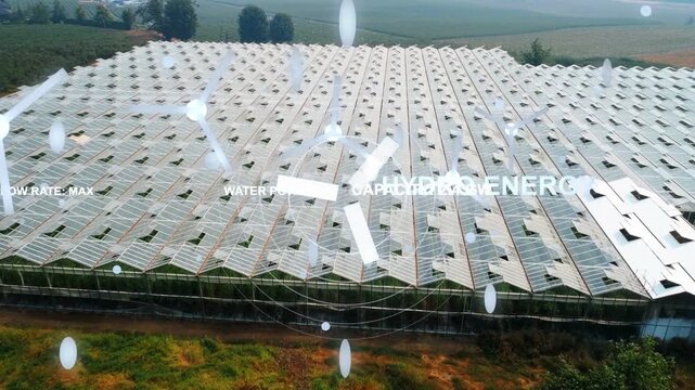 Greenhouse roof array receiving data ping, drone pulling back, HUD rotating, showing hydro capacity
