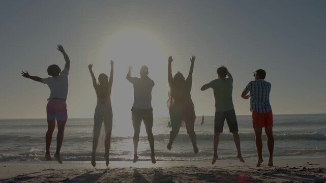 Six adults shifting weight and stepping into surf, sparks overlay celebrating jumps for marketing
