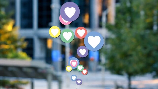 Tiny cluster sparking colorful heart badges rising rotating stacking to form layered stream