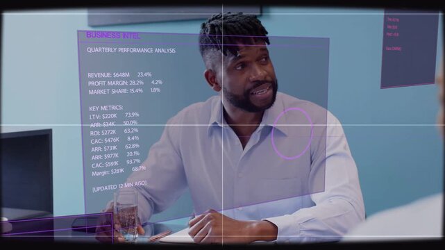 Manager sitting at table holo UI appearing pointing at purple chart reviewing Qtr business metrics