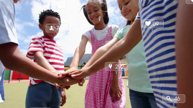 Arm passing, camera pulling back, kids stacking hands on play area, social icons floating, cheering