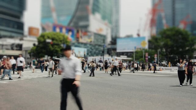 Miniature tilt-shift effect crowd crossing shibuya intersection