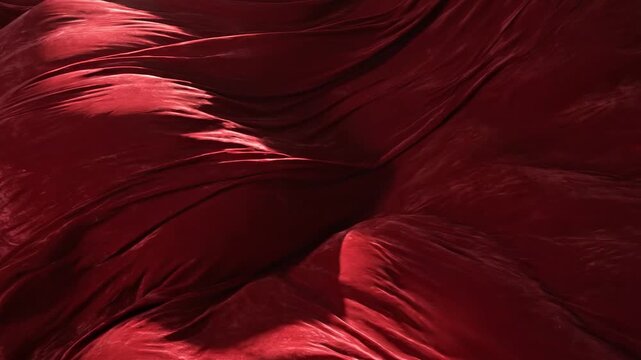 Abstract Red Fabric Flowing in Slow Motion.