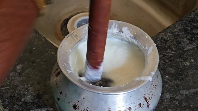 With a rhythmic spin, a woman&rsquo;s bangles chime as her hands guide the Madhani through rich curd. This traditional craft yields cool buttermilk, fresh butter, and finally, pure, golden ghee.