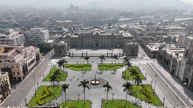 Plaza De Armas In Lima Capital City Peru. Aerial View Of A City Park Surrounded By Busy Streets And Buildings. Metropolitan Landscape Commercial Building Vibrant. Commercial Building.