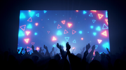 Naklejka premium Concert crowd with hands in the air enjoying a vibrant music festival experience