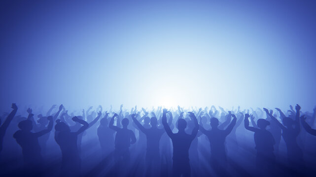 Energetic crowd at a music concert with hands raised towards the stage lights