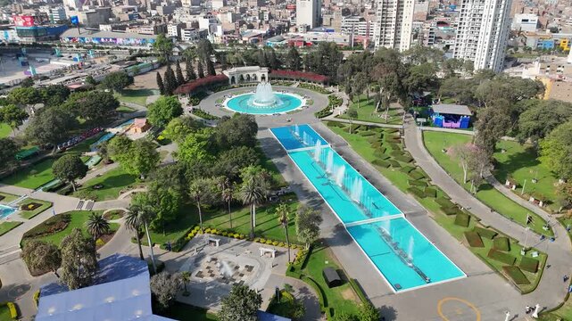 La Reserva Park In Lima Metropolitan Region Peru. Famous Botanical Garden Showing The Around The City. Business Sky Background Downtown Cityscape. Backgrounds Panning Wide. Lima metropolitan region.