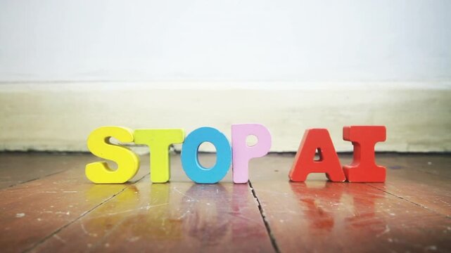 STOP AI message with wooden letters 