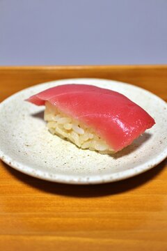 Toro (fatty tuna) Edomae nigirizushi made with red vinegar purchased at a supermarket in Tokyo, Japan