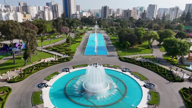 Parque De La Reserva In Lima Capital City Peru. Breathtaking Aerial Landscape Of Famous Leisure Park Of The City. Business Sky Background Downtown Cityscape. Outdoor Downtown Panorama.