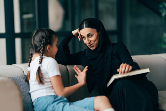 Traditional arabian family from Dubai spending time together at home