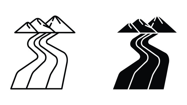 Road splitting between two mountain peaks with snowy tops