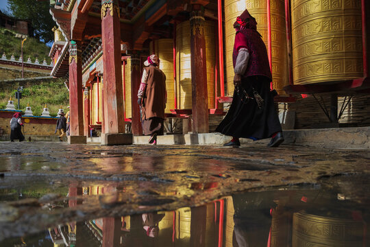 Pilgrims walking around Prayer Wheels, Tagong temple