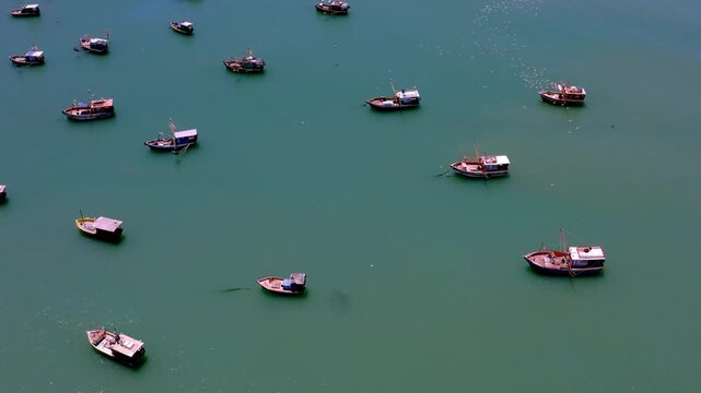 Aerial view of fishing boats on Ponta Verde beach, Maceio, Alagoas, Brazil.
