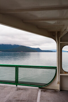San Juan Islands ferry, a view from the deck of islands and calm water.