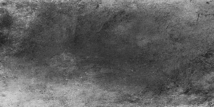 A dark vintage grunge texture background featuring an aged black and white rough surface with distressed grey concrete and stone pattern design