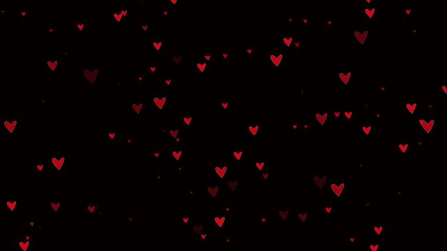Animated red candy Hearts on a black background. Loop video footage