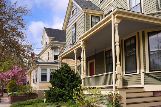 Street of typical New England houses with colorfully painted clapboard