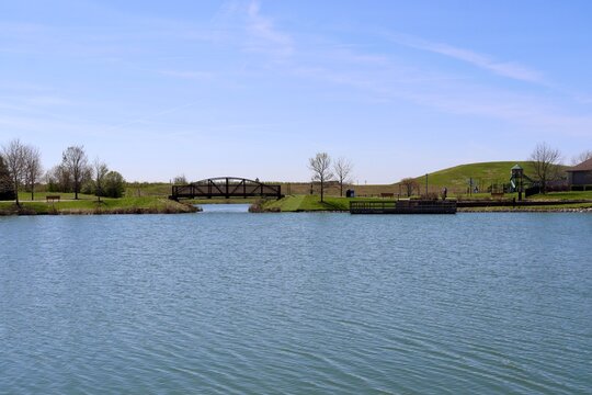 The peaceful lake in the park on a sunny day.