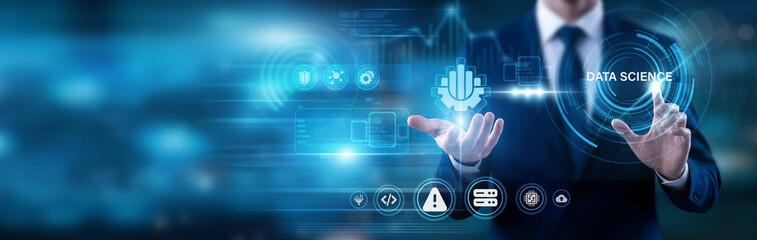 Fototapeta premium Scientist pointing at Data science text. Combining statistics, scientific methods, and algorithms to extract meaningful knowledge and insights from large volumes of complex data sets.