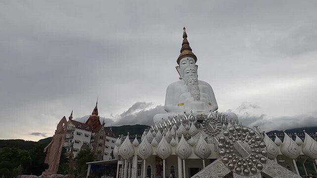 Famous white Five Buddhas sitting on the mountain at Wat Phra That Pha Sorn Kaew, Phetchabun.