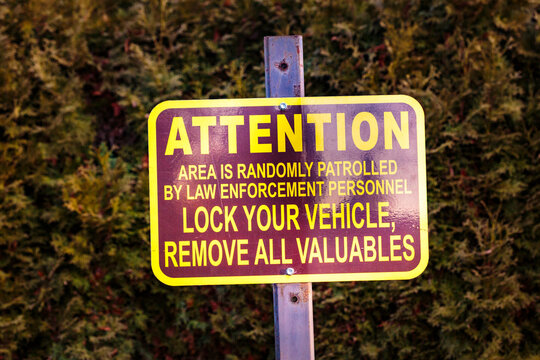 Lock Your Vehicles sign in a public park, Spokane, WA USA