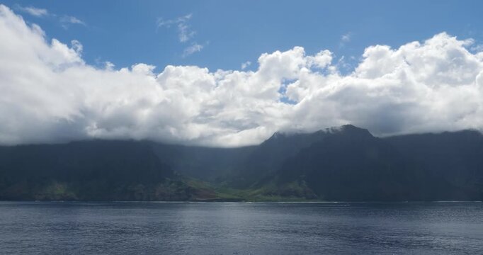 Napali Coast, Hawaii. Beautiful Landscape of the Napali coastline with emerald-hued cliffs with razor-sharp ridges towering above the Pacific Ocean and deep,narrow valleys.View from the ocean.