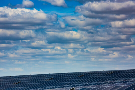 Solar farm, Lind, ranks of solar panels on a hillside.