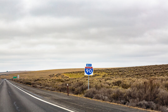 West I-90 road sign in high desert, Rye Grass Summit, nterstate 90